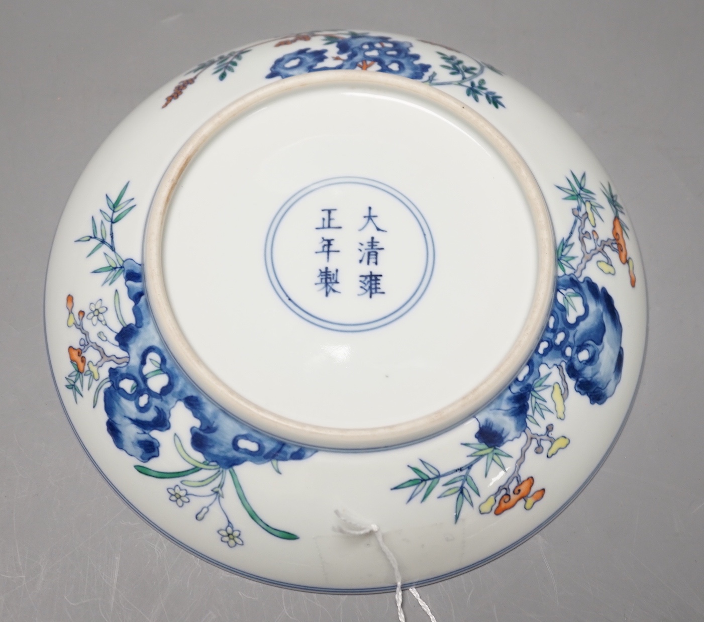 A Chinese doucai saucer dish, Yongzheng mark but later 20cm diameter